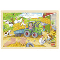 Wooden puzzle with farm animals and a tractor on a wooden frame