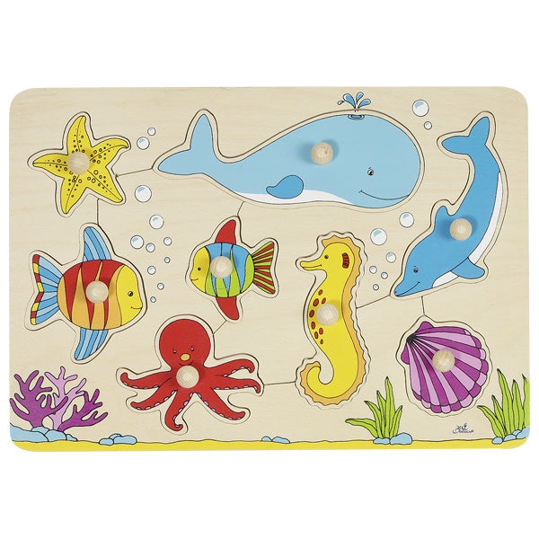 Wooden puzzle with colorful sea animal figures on a beige background