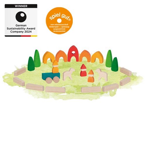 Colorful wooden toy set with animals and trees on a white background, featuring 'spiel gut' and German Sustainability Award logos.