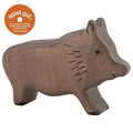 Wooden boar toy with 'spiel gut' certification logo on a white background