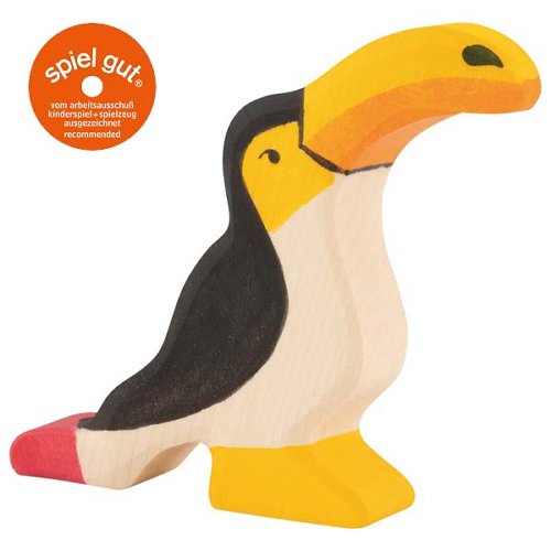 Wooden toucan toy with 'spiel gut' label on a white background