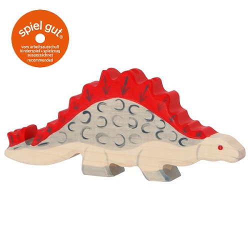 Wooden toy dinosaur with red spikes on a white background, featuring the 'spiel gut' logo.