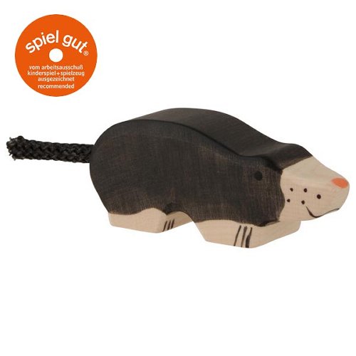Wooden toy hedgehog with a 'spiel gut' label on a white background