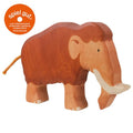 Wooden elephant toy with 'spiel gut' label on a white background