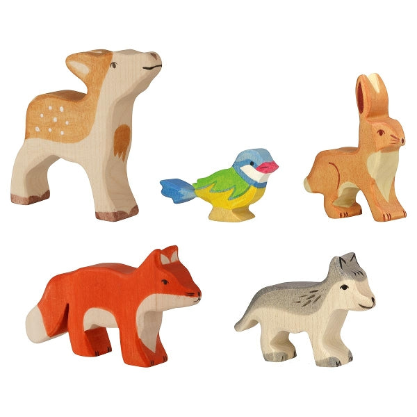 Set of wooden animal figurines including a bear, bird, rabbit, fox, and wolf on a white background