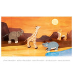 Set of toy animals including a giraffe, elephant, lion, and hippo on a wooden platform with a sunset background.