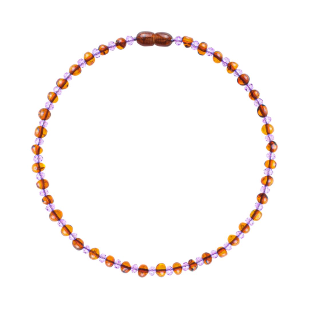 Necklace with alternating brown and purple beads on a white background