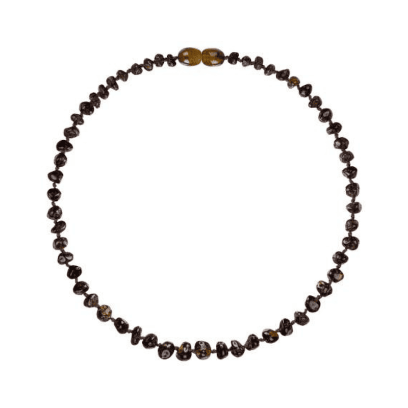 Necklace with dark green beads on a white background