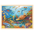 Colorful underwater scene puzzle with dolphins, turtles, and various sea creatures on a white background.