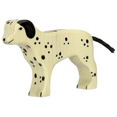 Wooden dog toy with black spots on a white background