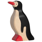 Wooden penguin toy with a red beak and feet on a white background