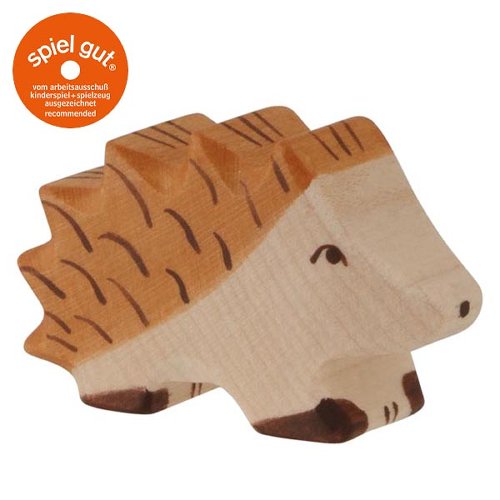 Wooden hedgehog toy with 'spiel gut' logo on a white background