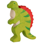 Green dinosaur toy figure with red back plate on a white background