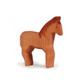 Wooden horse figurine on a white background